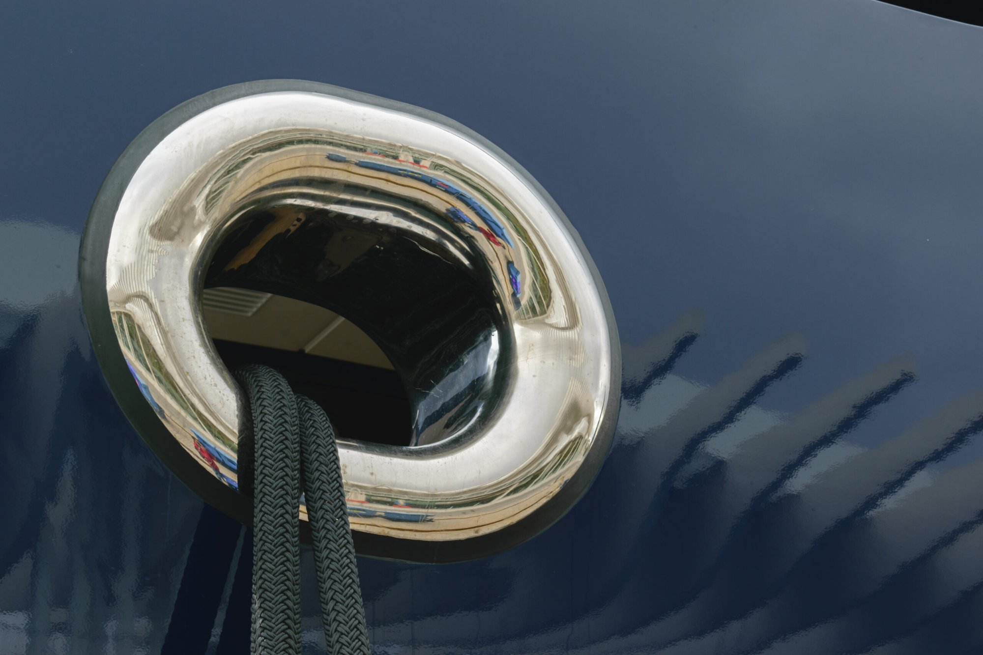Polished yacht hawse pipe detail